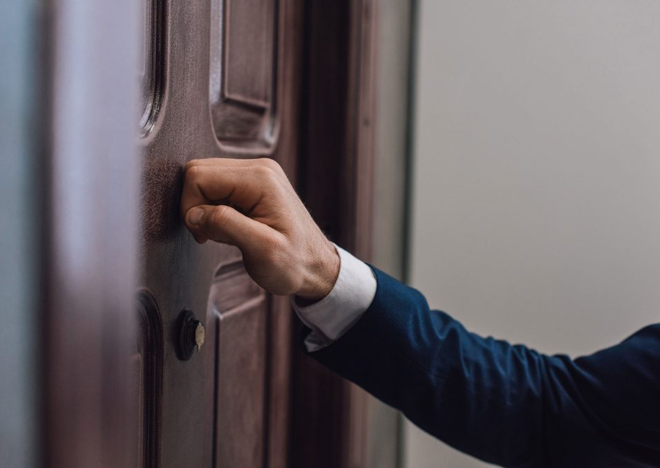 cropped-view-of-collector-knocking-on-door-with-ha-2022-11-02-01-27-51-utc cropped-view-of-collector-knocking-on-door-with-ha-2022-11-02-01-27-51-utc